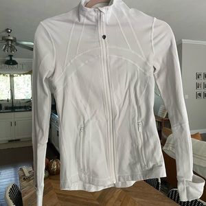 Lululemon jacket. Size 6. White. Small tear in fabric on right elbow.